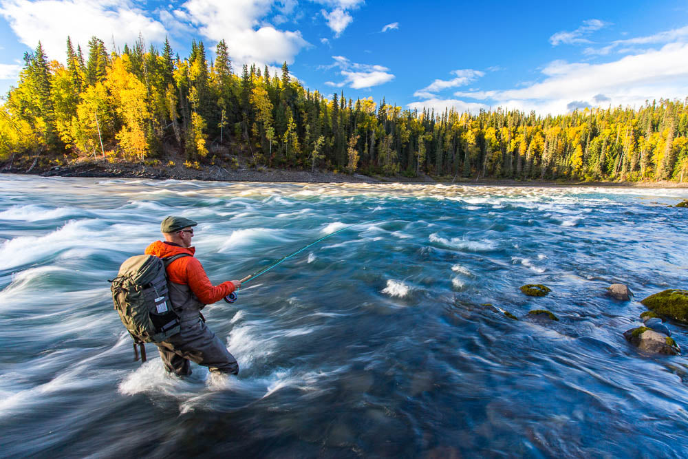 Man fishing in river