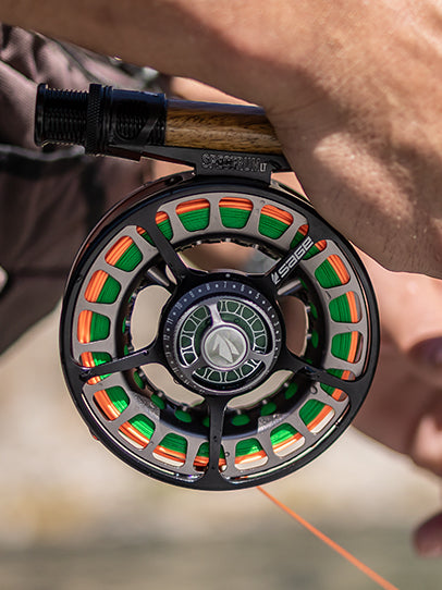Four trout and salmon fly reels: including a Sage 506 bronze finish reel,  31/2; a Ryobi 357 superl.