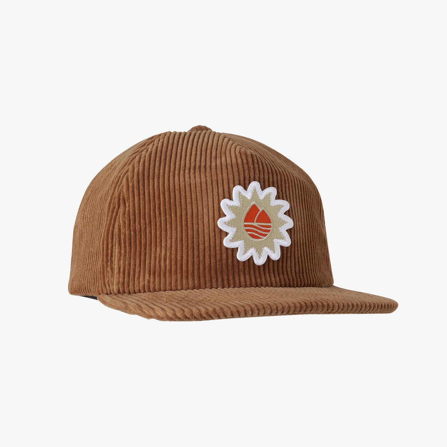 A beige corduroy baseball cap with an embroidered patch on the front featuring a sun and Redington logo