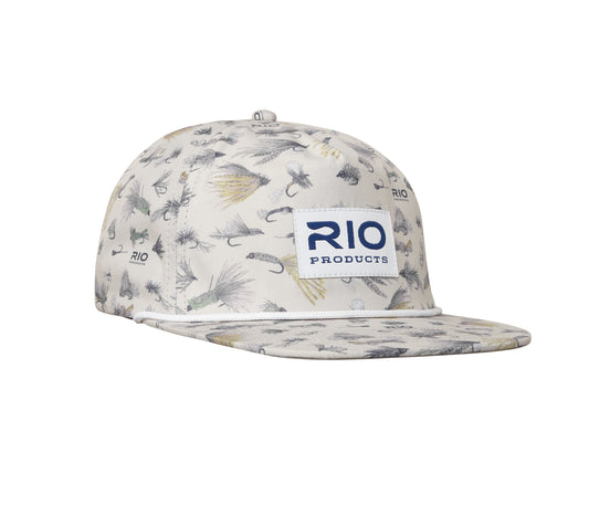 A beige hat with a camouflage pattern featuring various flies and the logo 'RIO Products' on the front.